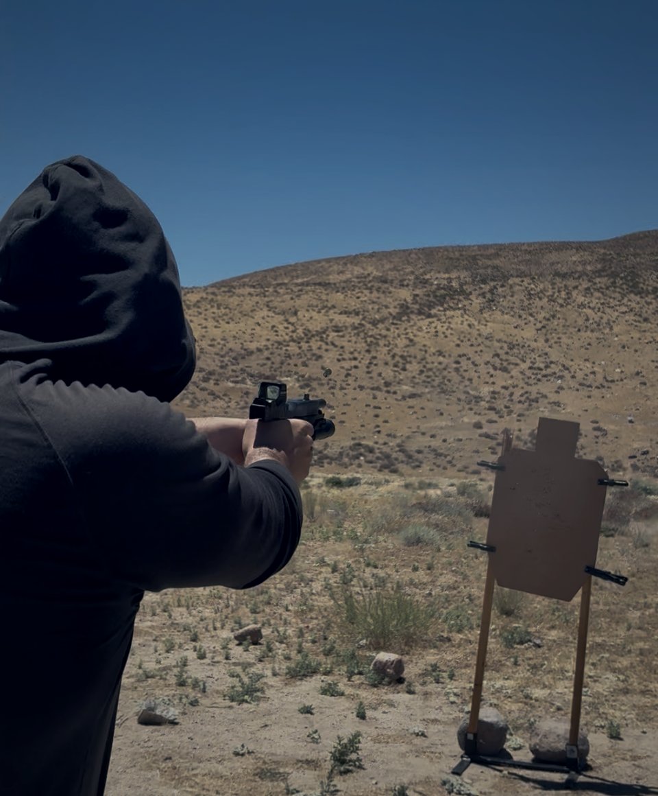 Practical Pistol course, duty pistol on the line